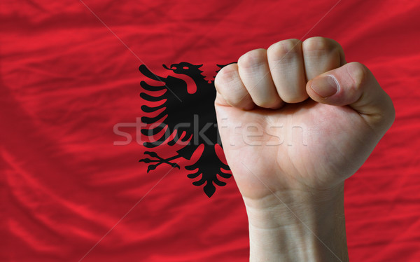 Hard fist in front of albania flag symbolizing power Stock photo © vepar5