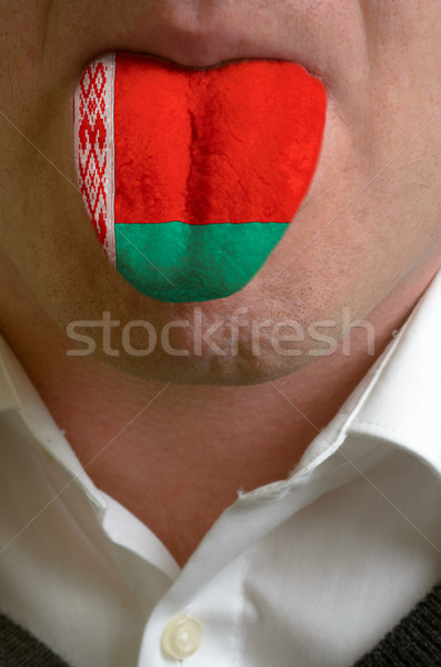 man tongue painted in belarus flag symbolizing to knowledge to s Stock photo © vepar5