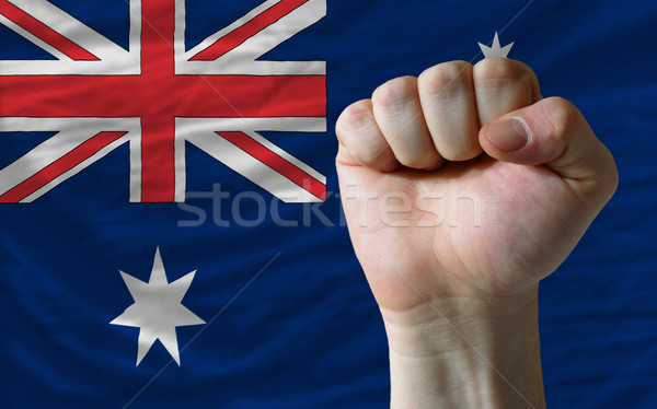 Hard fist in front of australia flag symbolizing power Stock photo © vepar5