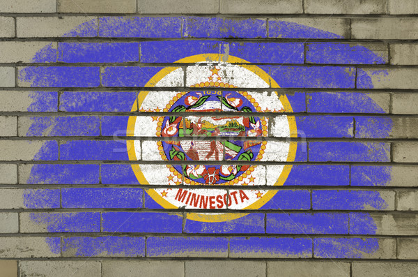 Stock photo: grunge flag of US state of minnesota on brick wall painted with 