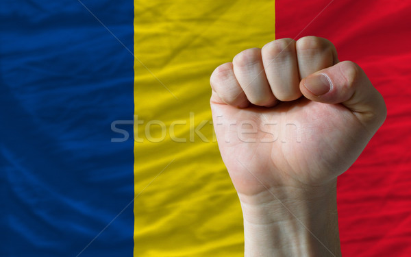 Hard fist in front of romania flag symbolizing power Stock photo © vepar5