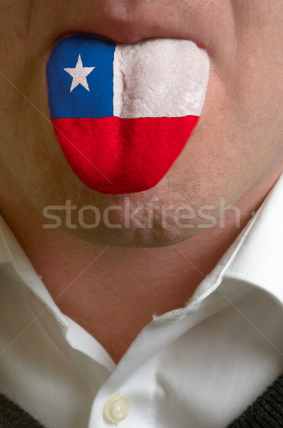 man tongue painted in chile flag symbolizing to knowledge to spe Stock photo © vepar5
