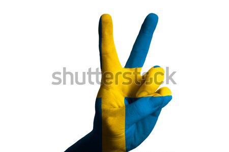 ukraine national flag two finger up gesture for victory and winn Stock photo © vepar5