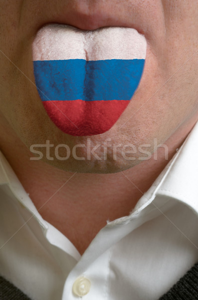 [[stock_photo]]: Homme · langue · peint · Russie · pavillon · connaissances