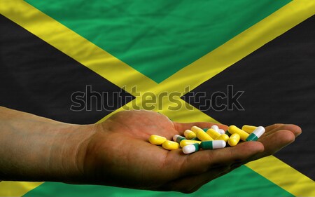 Heart and love gesture showed by hands over flag of jamaica back Stock photo © vepar5