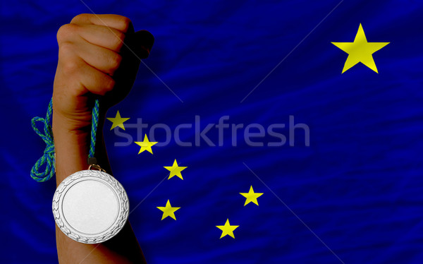 Silver medal for sport and  flag of american state of alaska    Stock photo © vepar5