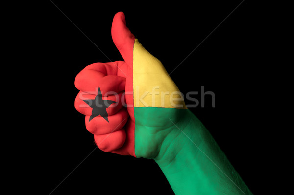 Foto stock: Guiné · bandeira · polegar · para · cima · gesto · excelência