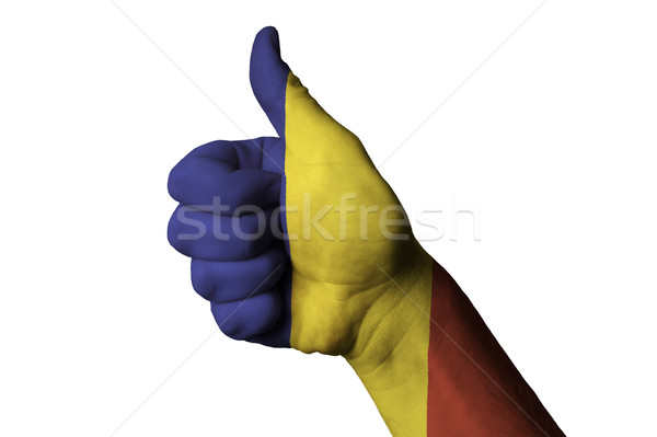 romania national flag thumb up gesture for excellence and achiev Stock photo © vepar5