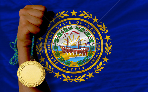stock photo: gold medal for sport and flag of