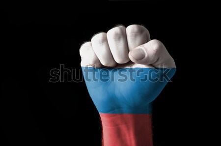 Fist painted in colors of cambodia flag Stock photo © vepar5
