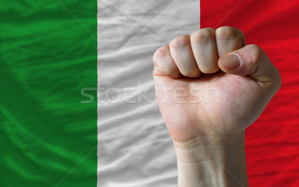 Hard fist in front of italy flag symbolizing power Stock photo © vepar5
