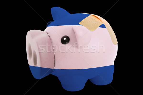 bankrupt piggy rich bank in colors of national flag of nicaragua Stock photo © vepar5