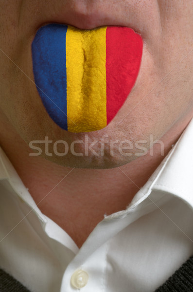 man tongue painted in romania flag symbolizing to knowledge to s Stock photo © vepar5