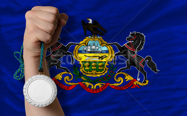 Silver medal for sport and  flag of american state of pennsylvan Stock photo © vepar5