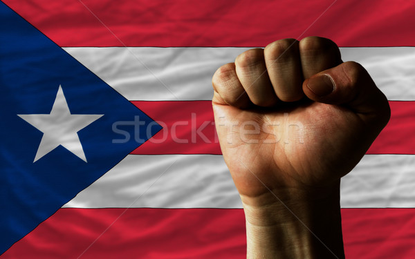 Hard fist in front of puertorico flag symbolizing power Stock photo © vepar5