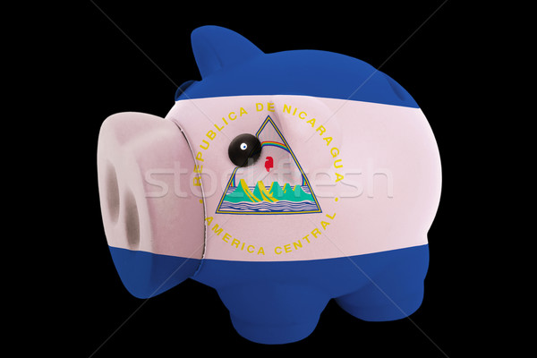 piggy rich bank in colors national flag of nicaragua   for savin Stock photo © vepar5