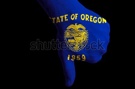 Fist painted in colors of us state of oregon flag Stock photo © vepar5