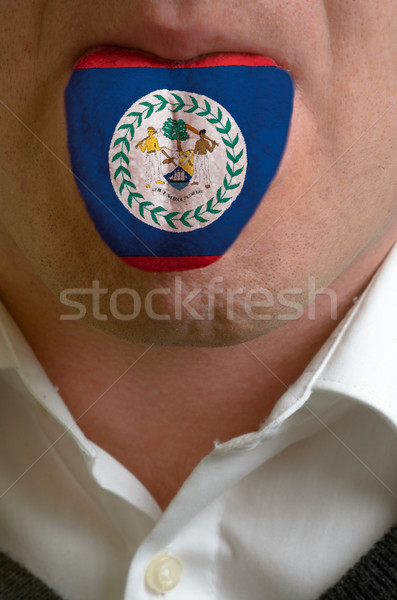 man tongue painted in belize flag symbolizing to knowledge to sp Stock photo © vepar5
