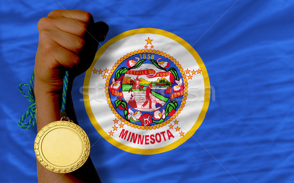 Stock photo: Gold medal for sport and  flag of american state of minnesota   