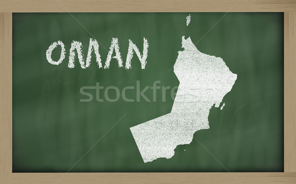 outline map of oman on blackboard  Stock photo © vepar5