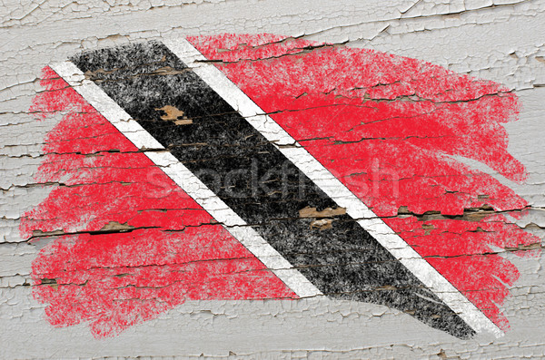 flag of trinidad and tobago on grunge wooden texture painted wit Stock photo © vepar5