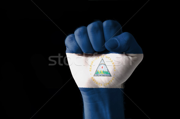 Fist painted in colors of nicaragua flag Stock photo © vepar5