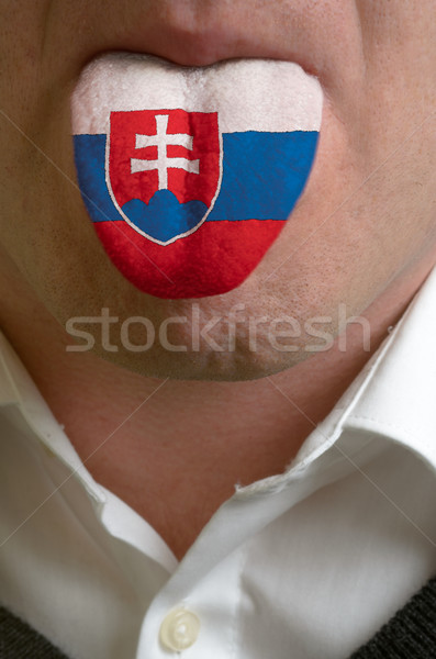 man tongue painted in slovakia flag symbolizing to knowledge to  Stock photo © vepar5