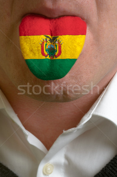 man tongue painted in bolivia flag symbolizing to knowledge to s Stock photo © vepar5