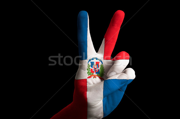 dominican national flag two finger up gesture for victory and wi Stock photo © vepar5