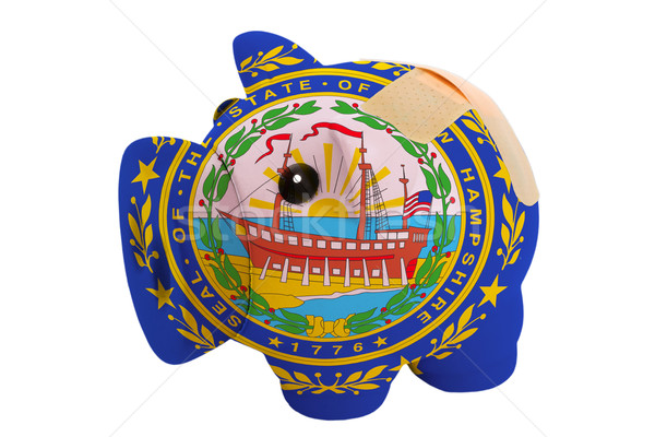 closed piggy rich bank with bandage in colors flag of american s Stock photo © vepar5