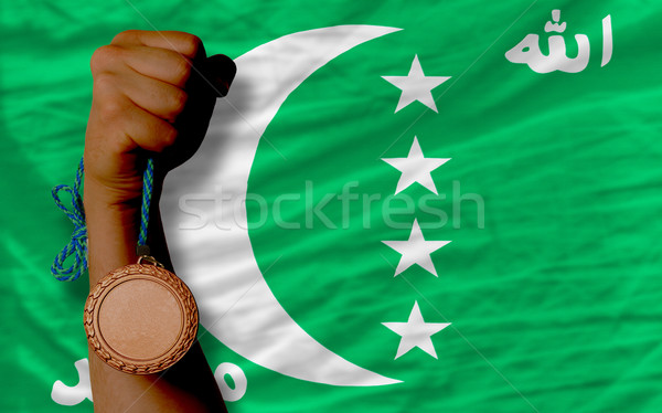 Bronzo medaglia sport bandiera Comore Foto d'archivio © vepar5