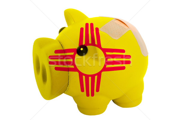 closed piggy rich bank with bandage in colors flag of american s Stock photo © vepar5