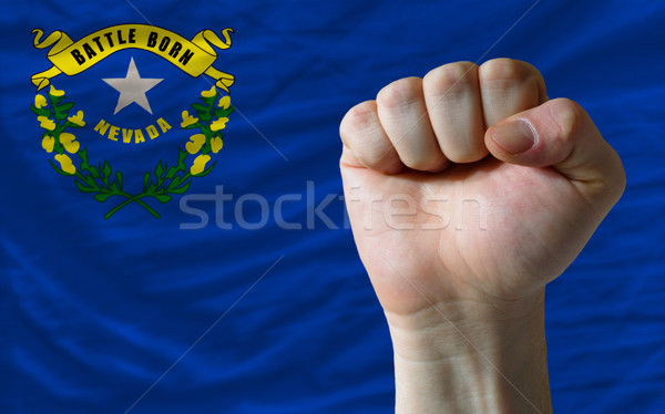 us state flag of nevada with hard fist in front of it symbolizin Stock photo © vepar5