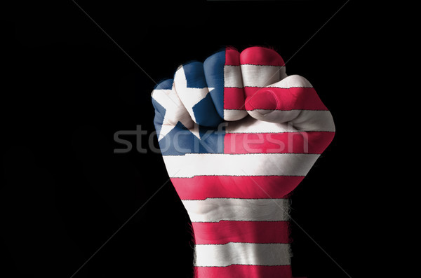 Fist painted in colors of liberia flag Stock photo © vepar5