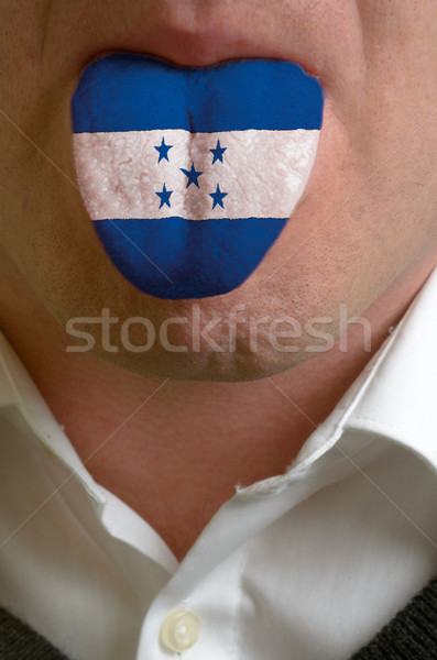 Mann Zunge gemalt Honduras Flagge Wissen Stock foto © vepar5