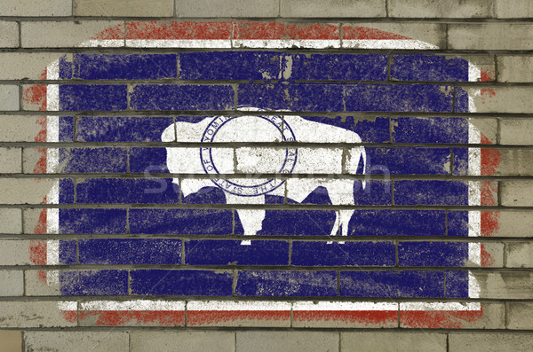 flag of US state of wyoming on brick wall painted with chalk Stock photo © vepar5