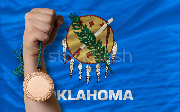Bronze medal for sport and  flag of american state of oklahoma   Stock photo © vepar5