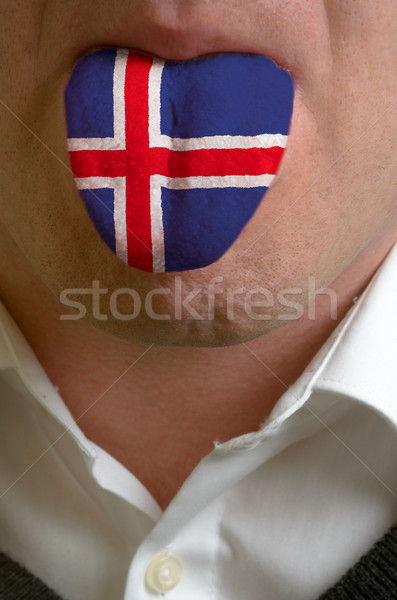 man tongue painted in iceland flag symbolizing to knowledge to s Stock photo © vepar5