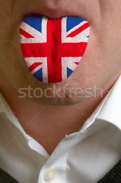 man tongue painted in gunited kingdom flag symbolizing to knowle Stock photo © vepar5