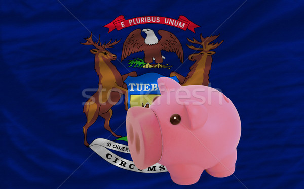 piggy rich bank and  flag of american state of michigan    Stock photo © vepar5