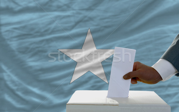 Homem votação eleições bandeira Somália cédula Foto stock © vepar5