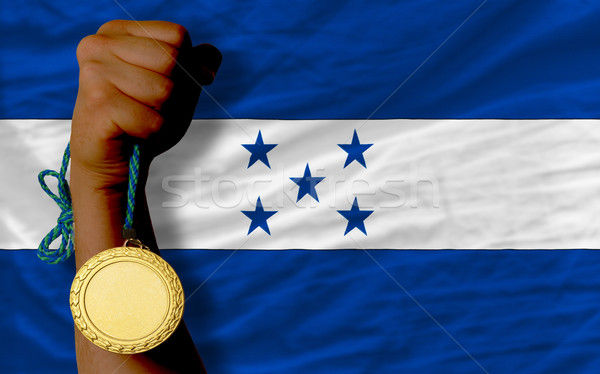 Goldmedaille Sport Flagge Honduras Gewinner halten Stock foto © vepar5