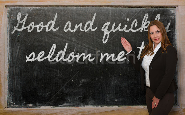 Teacher showing Good and quickly seldom meet on blackboard Stock photo © vepar5