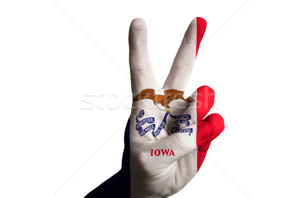 iowa us state flag two finger up gesture for victory and winner  Stock photo © vepar5