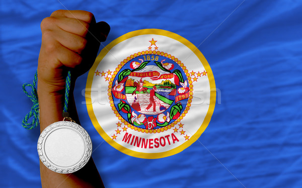 Silver medal for sport and  flag of american state of minnesota  Stock photo © vepar5