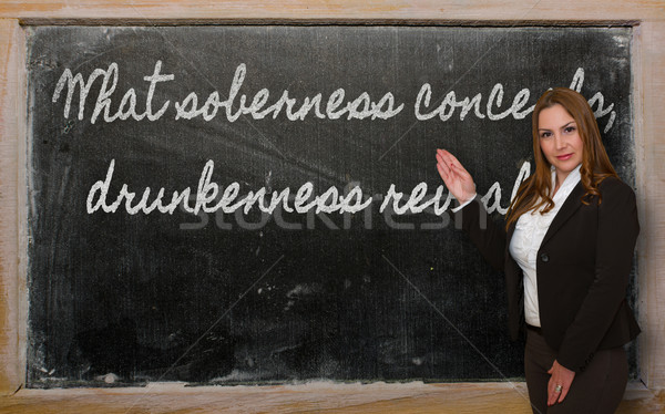 Teacher showing What soberness conceals, drunkenness reveals on  Stock photo © vepar5