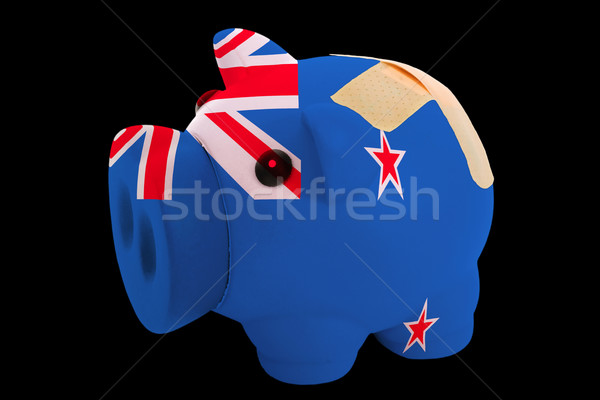 bankrupt piggy rich bank in colors of national flag of new zeala Stock photo © vepar5