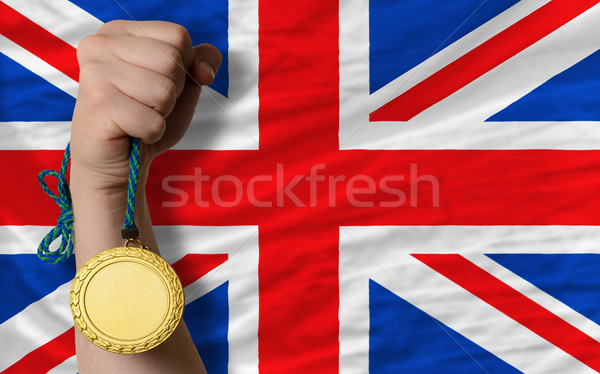 Goldmedaille Sport Flagge Vereinigtes Königreich Gewinner halten Stock foto © vepar5