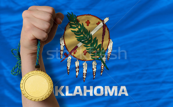 Gold medal for sport and  flag of american state of oklahoma    Stock photo © vepar5