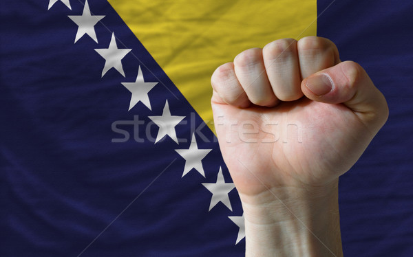 Hard fist in front of bosnia herzegovina flag symbolizing power Stock photo © vepar5
